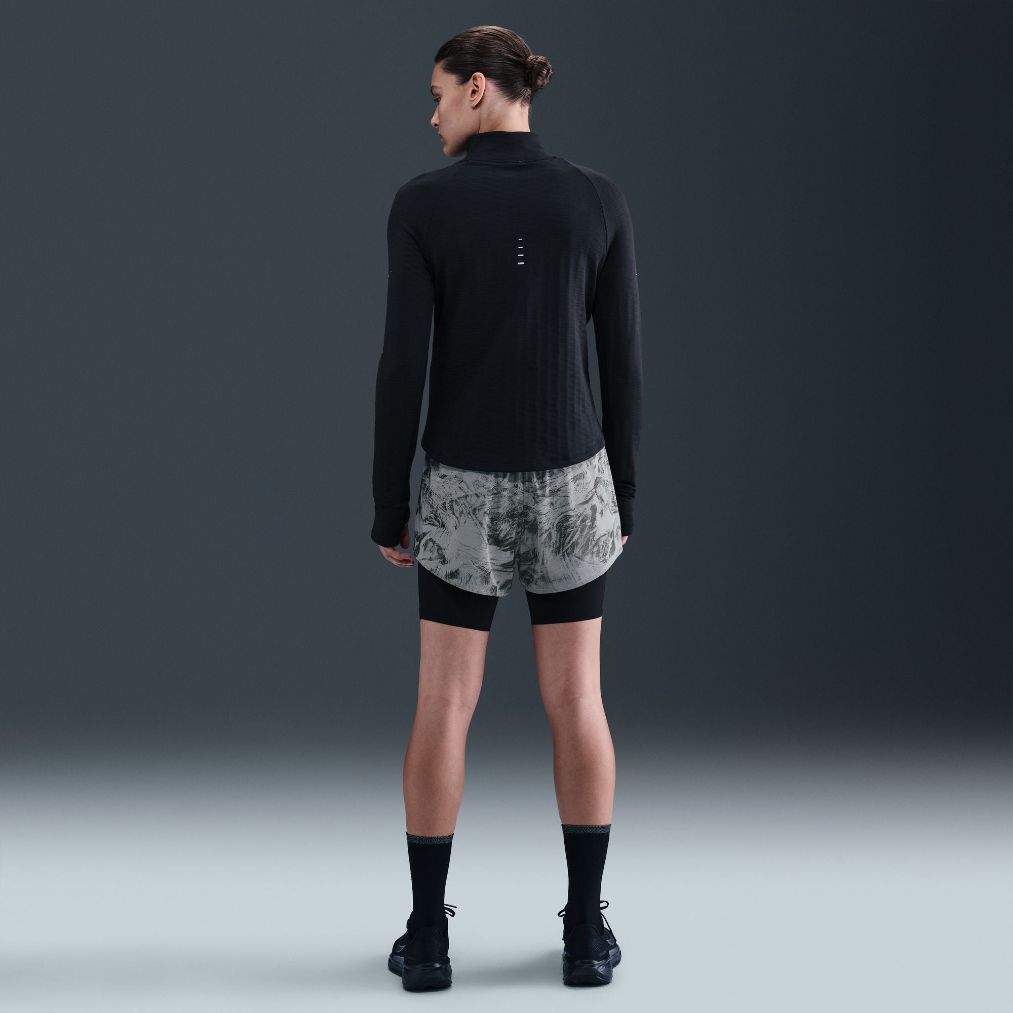 Nike Swift Shorts 2 en 1 · Mujer